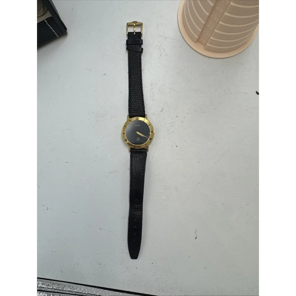 Vintage 33mm Gucci 3001M Roman Bezel Unisex Quartz Wristwatch Swiss Gold Plated